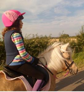 My daughter riding Crystal